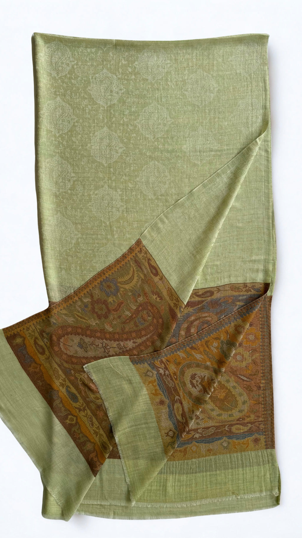 Pistachio green fine pashmina ring (Palladar) shawl with amber paisley border, laid flat