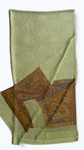 Pistachio green fine pashmina ring (Palladar) shawl with amber paisley border, laid flat