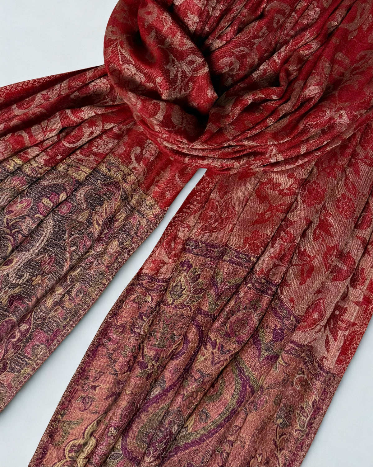 Scarlet fine pashmina ring (Palladar) shawl with indigo-ground paisley border, laid flat