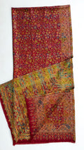 Crimson Zari Kani pashmina shawl laid flat, dense gold and multicoloured flowering field within a wide ornamented border