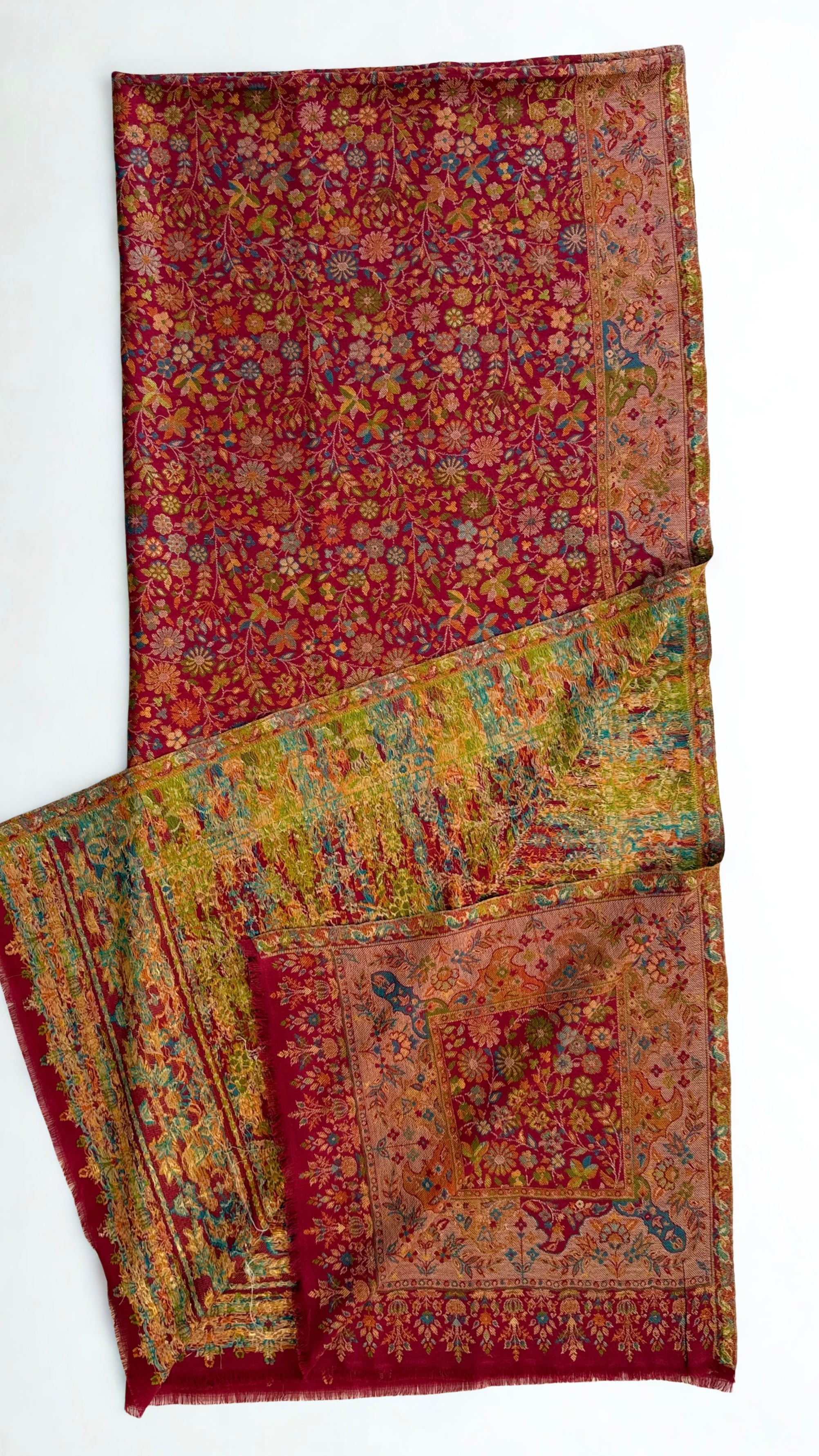 Crimson Zari Kani pashmina shawl laid flat, dense gold and multicoloured flowering field within a wide ornamented border