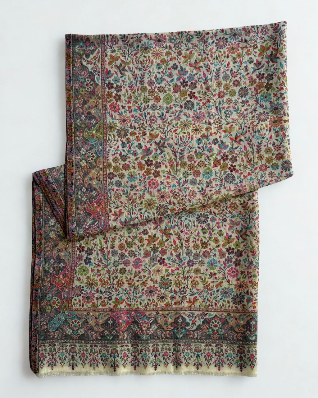 Ivory Zari Kani pashmina shawl laid flat, dense scattered floral field framed by a deep slate border and fringed end band