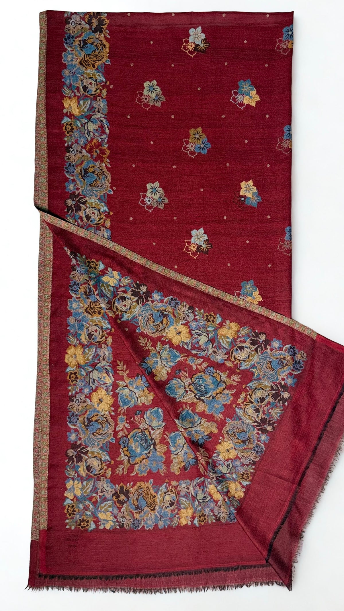 Claret Kani pashmina shawl gathered in a soft swirl, scattered blue and gold flower sprays with a wide rose border