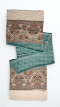 Sea green checked Kani pashmina shawl laid flat, showing the woven check field and deep ivory floral end border