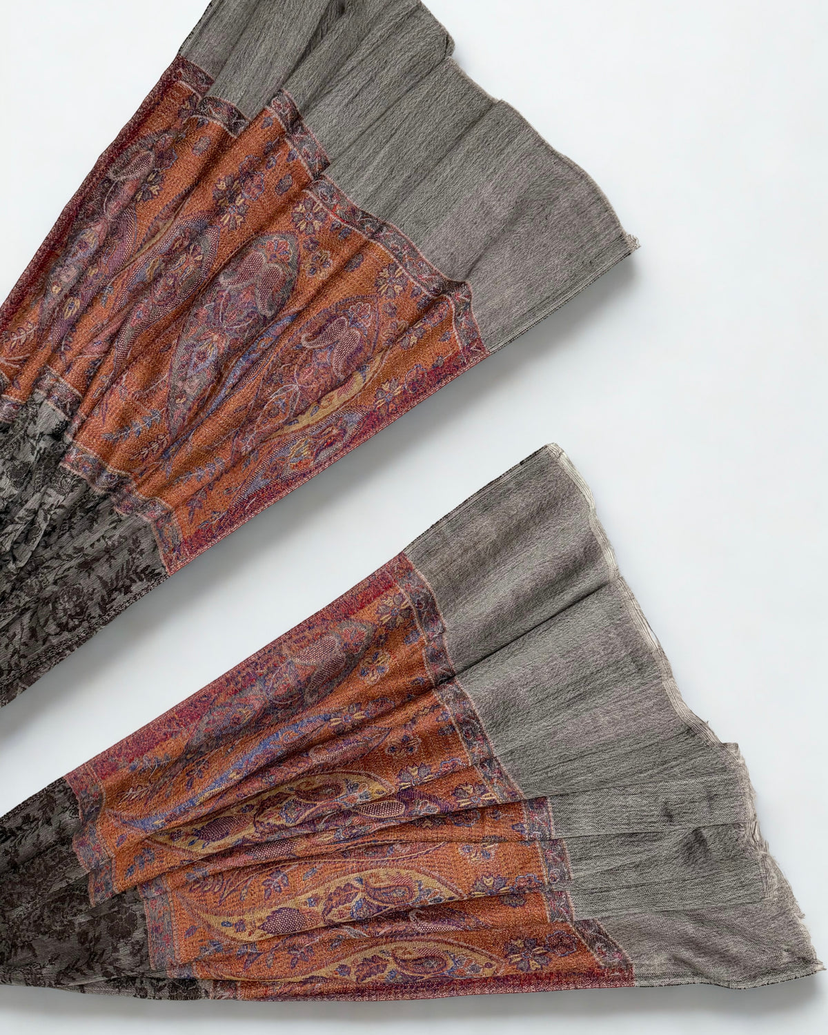 Detail where the self-patterned cocoa field meets the periwinkle band