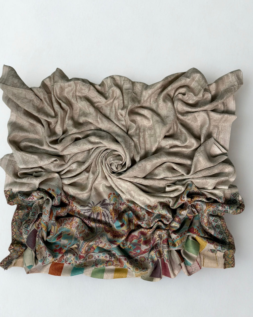 Stone grey fine pashmina ek rukh ring (Palladar) shawl with woven village landscape end panel, folded