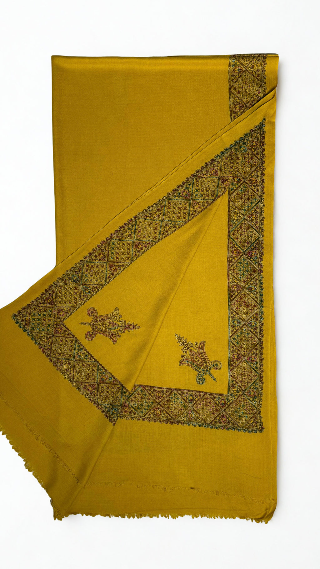 Mustard gold Swati Shahtoosh shawl with one corner turned back, showing the wide hand-embroidered lattice border and two paisley buta motifs on the field