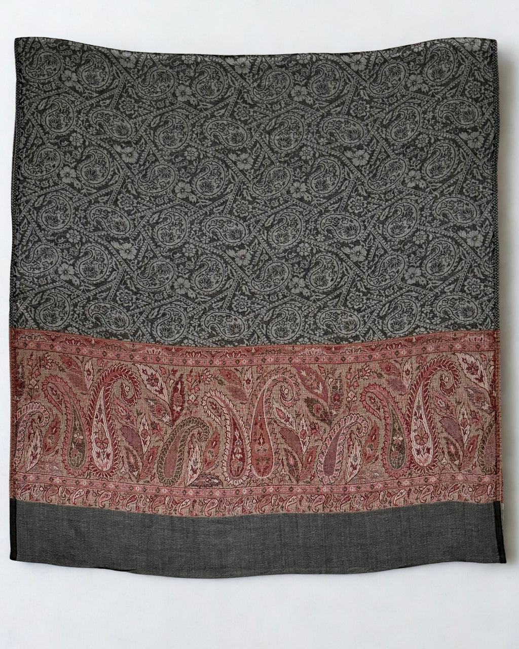 Close view of the antique rose border with large paisleys in olive and cream