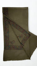 Olive brown Swati Shahtoosh shawl with one corner turned back, showing the wide hand-embroidered lattice border mitred at the corner with two paisley buta motifs