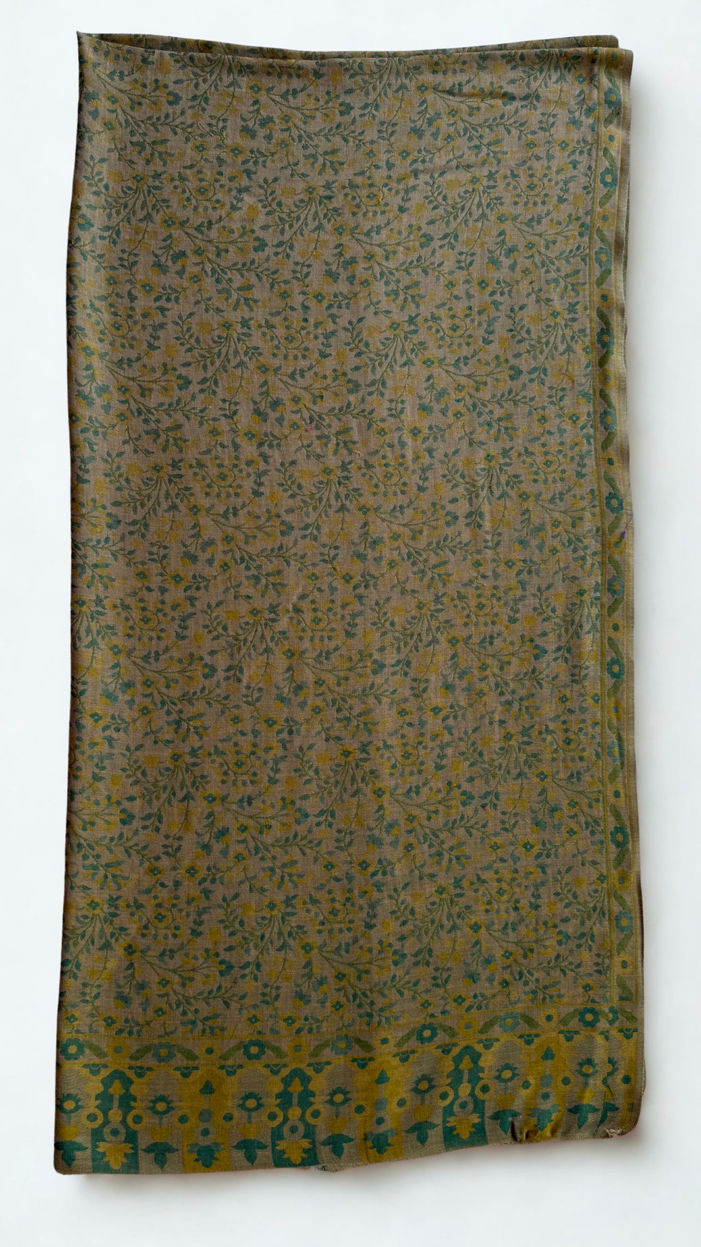 Moss and ochre Kani pashmina shawl folded lengthwise, showing the scrolling side border and the bold end panel