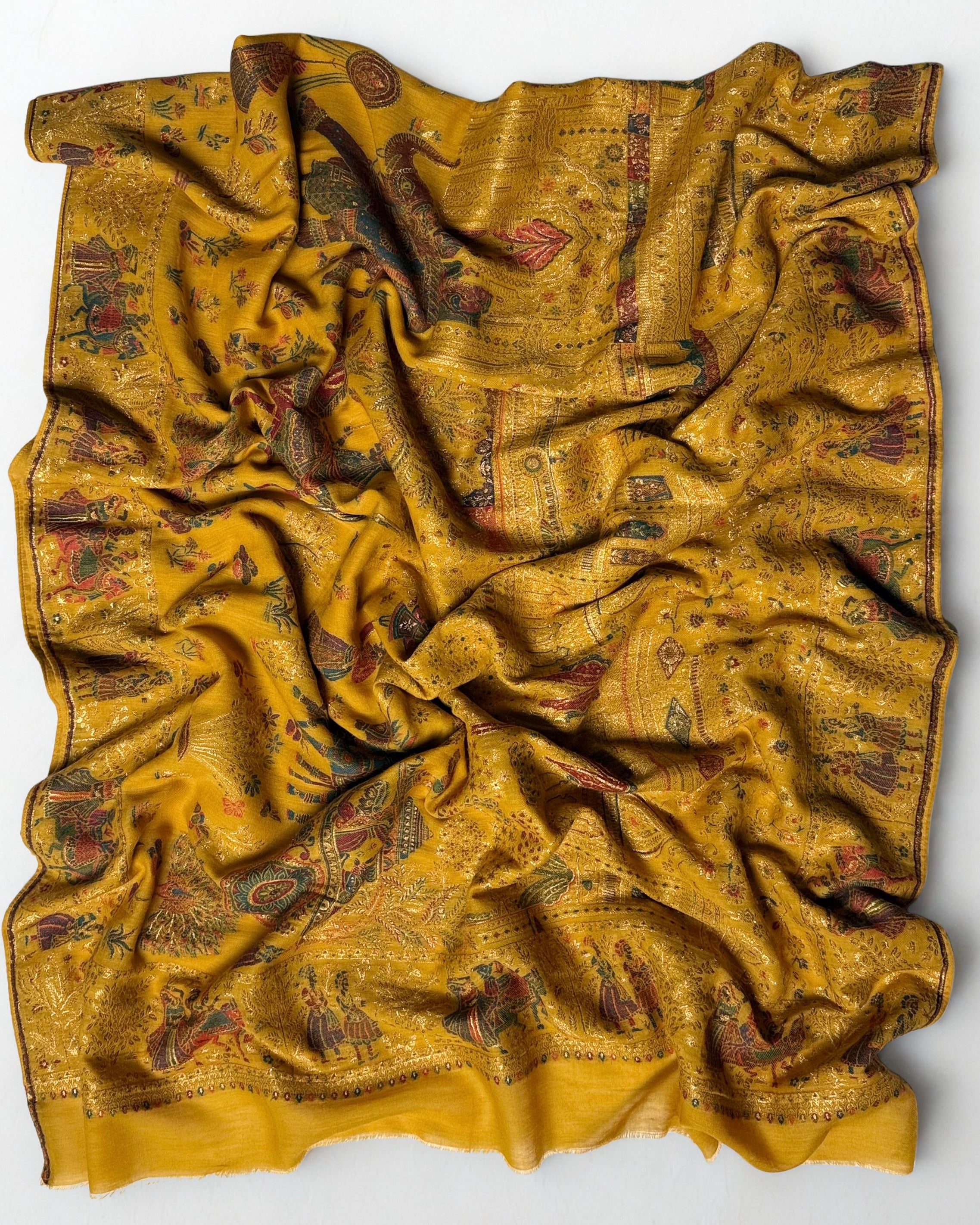 Detail of the figured border on a Mughal court Kani shawl, rows of individually dressed attendants beside elephants and horsemen