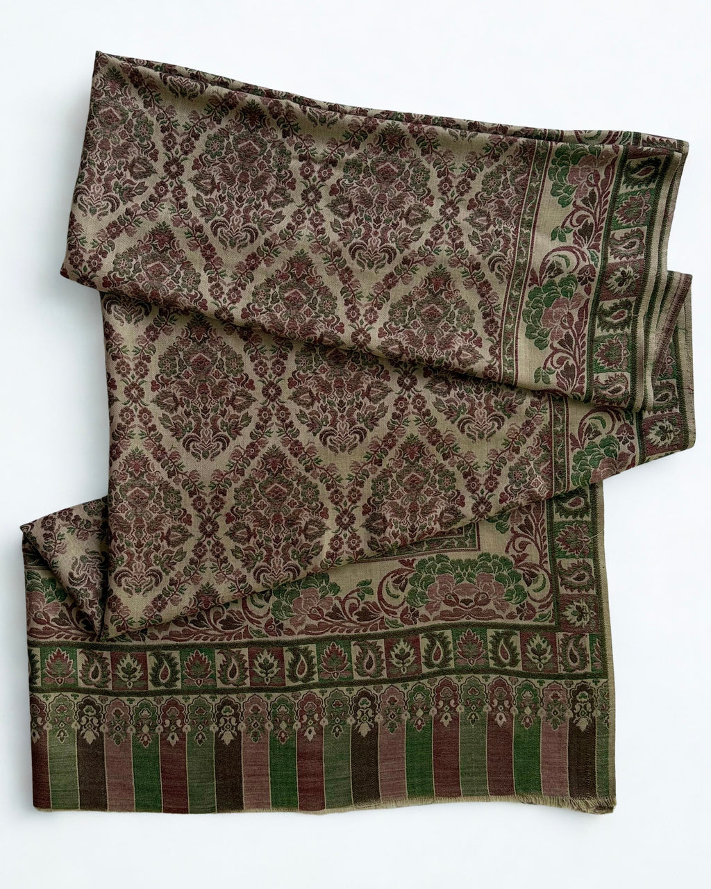 Plum and moss Kani pashmina shawl folded lengthwise, showing the floral side border and row of framed paisley cartouches