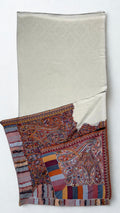 White pashmina ek rukh ring (Palladar) shawl with terracotta and dusty blue paisley end panel, shown full length