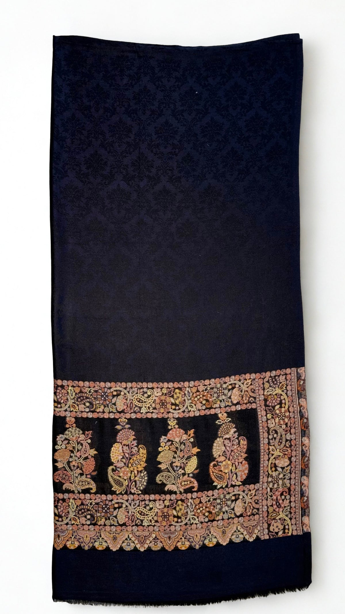 Navy fine pashmina ek rukh ring (Palladar) shawl with framed antique paisley end panel, laid flat