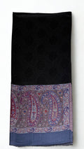 Black fine pashmina ring (Palladar) shawl with slate blue paisley border, on a wooden hanger