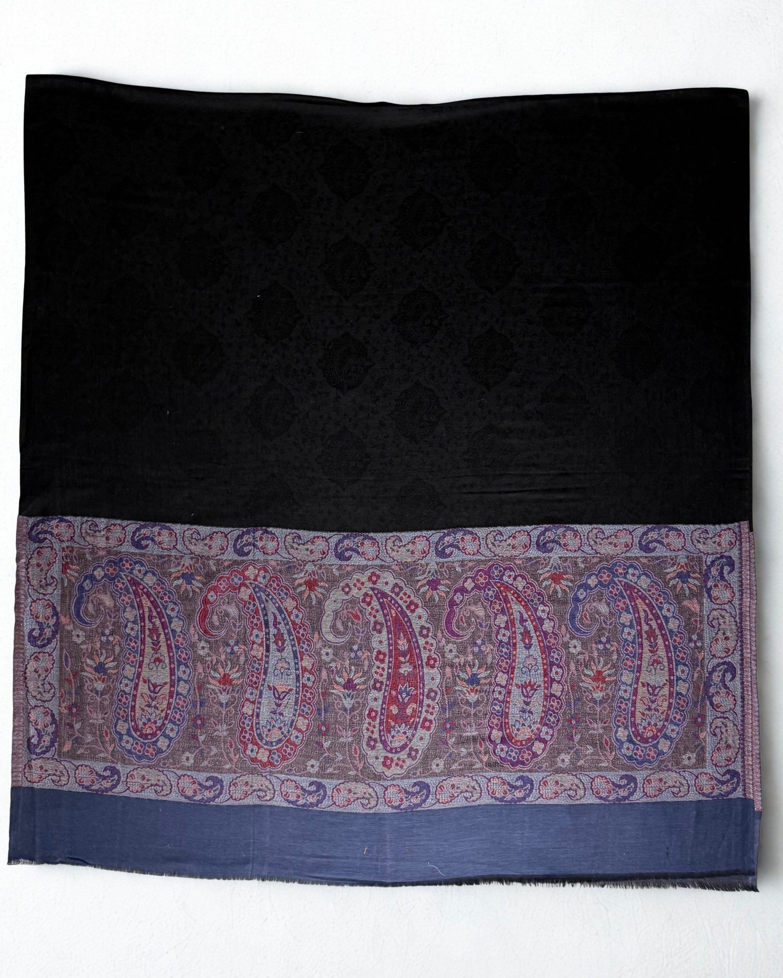 Both end panels of the black shawl side by side, borders matched