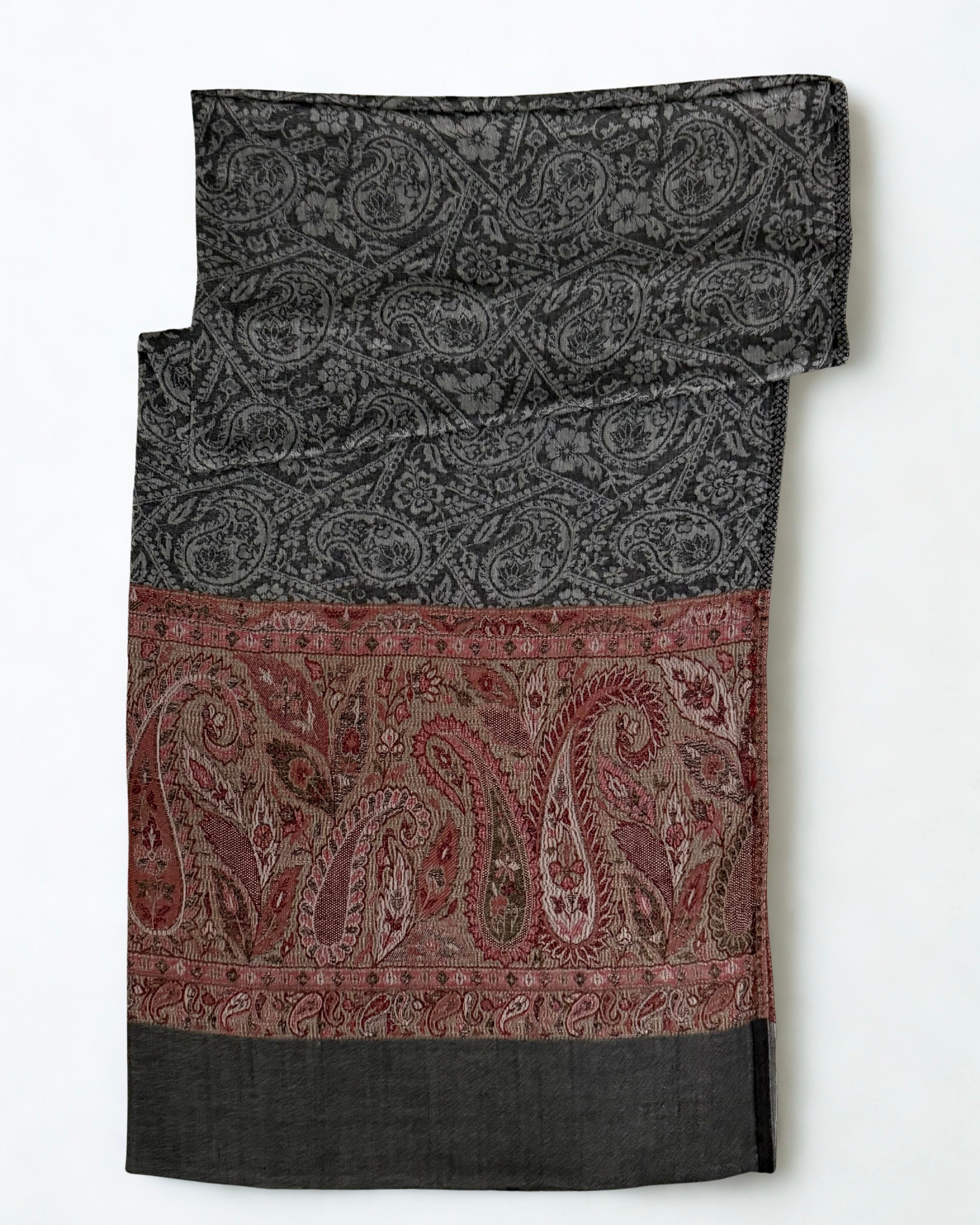 Charcoal Palladar shawl on a wooden hanger showing both rose borders and the plain end panels