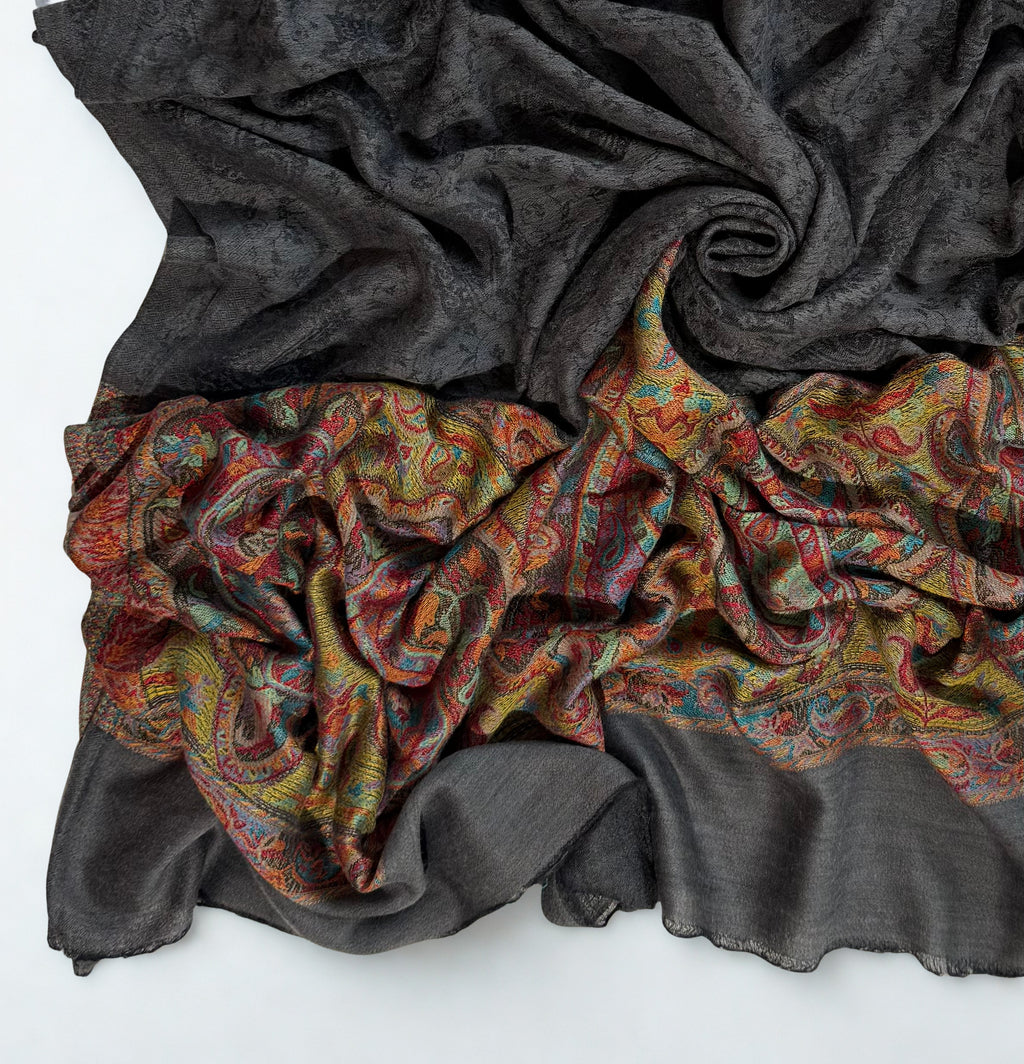 Full length of the graphite shawl showing the plain end panel below the palla