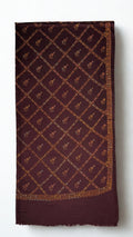 Wine Swati Shahtoosh shawl folded full length, hand-embroidered copper jaal across the whole field