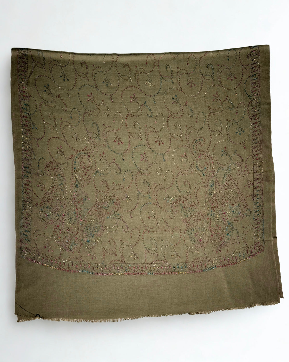 Olive brown Swati Shahtoosh shawl laid flat, the full hand-embroidered paisley jaal framed by a toothed border on all four sides