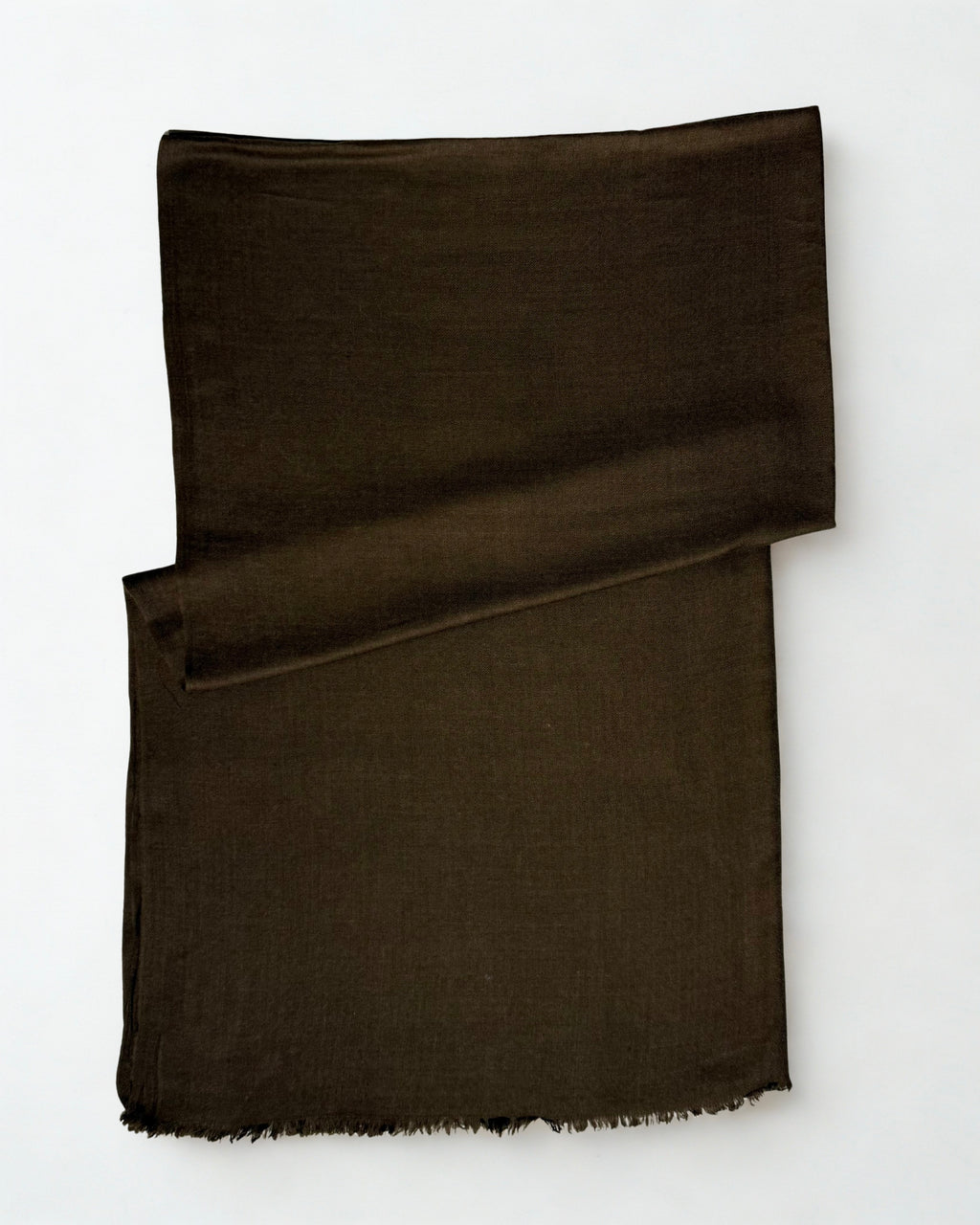 Warm brown Swati Shahtoosh shawl folded diagonally on a white background, plain with a natural fringed edge