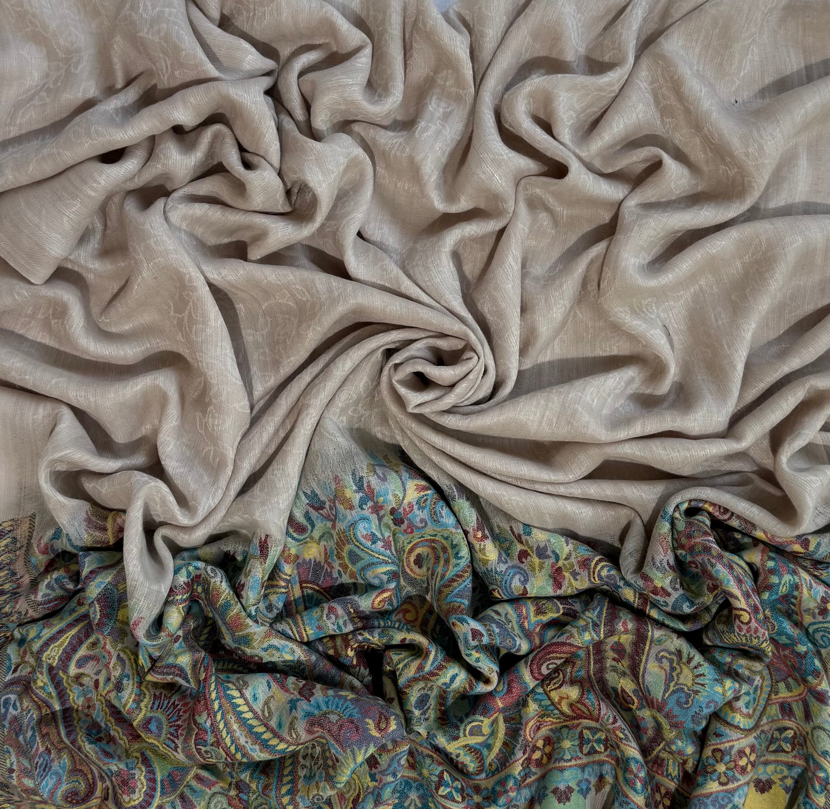 Stone grey Palladar shawl knotted, showing its drape and both paisley ends