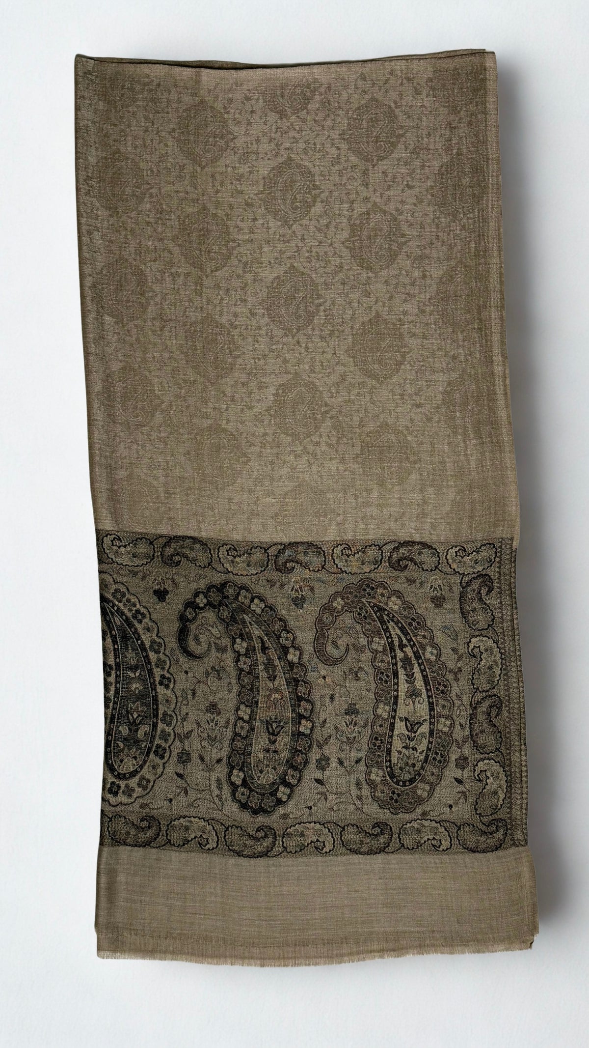 Fawn pashmina ring shawl folded, showing the tone-on-tone paisley medallion field and a palla of large black and brown paisleys