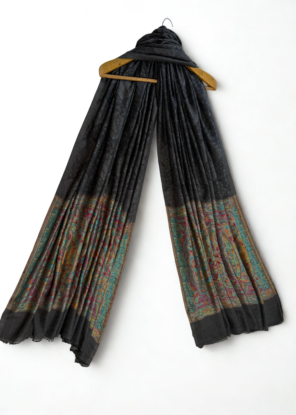Self-patterned paisley medallions woven into the graphite ground in the same colour
