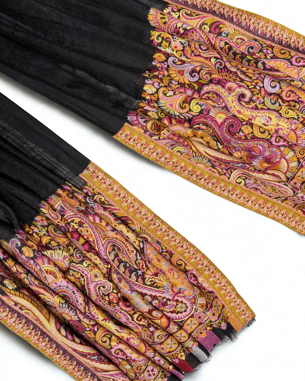Both ek rukh end panels of a black pashmina ring shawl laid side by side, showing the paisley design and fringed edge