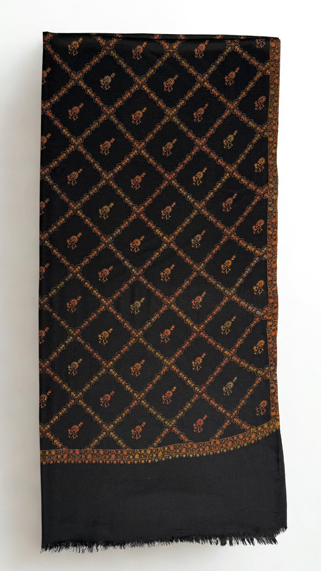 Black Swati Shahtoosh shawl folded full length, hand-embroidered gold jaal across the whole field