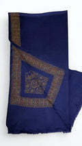 Navy Swati Shahtoosh shawl with one corner turned back, showing the wide hand-embroidered gold medallion border and the large flowering corner worked inside it