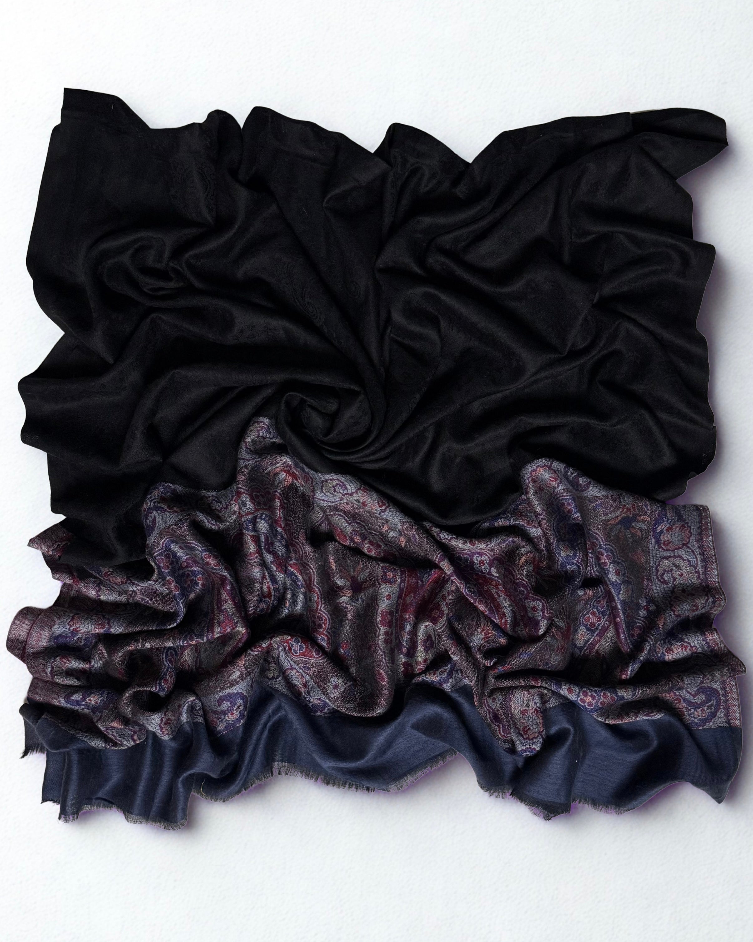 Detail of the border meeting the black ground, with the fringed slate blue edge below