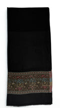 Black fine pashmina ek rukh ring (Palladar) shawl with a deep olive-ground paisley band, laid flat